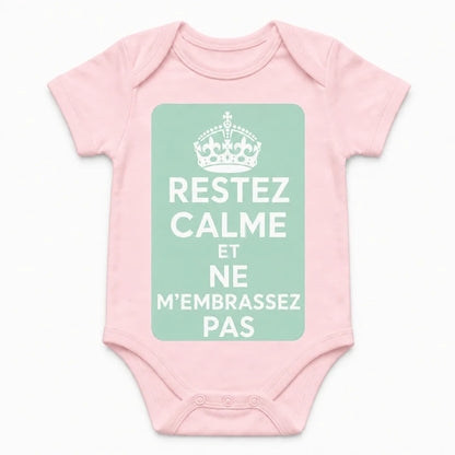 Keep Calm and Don't Kiss Me baby bodysuit in French, Pink